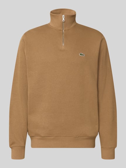 Produktfoto, Regular Fit Troyer aus reiner Baumwolle von Lacoste in hellem Braun mit Reißverschluss und Logo-Applikation, glatte Textur