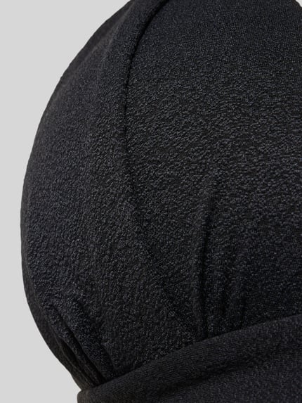 Produktfoto, Bikini-Oberteil mit Label-Detail Modell 'MAHO' von Banana Moon aus schwarzem Material-Mix mit Stretch-Anteil, strukturierte Oberfläche