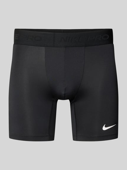 Produktfoto, spodenki kolarki z elastycznym pasem Nike Training, mieszanka materiałów z dodatkiem streczu, dopasowany krój, detale z logo, szerokość w rozmiarze M: 38 cm, długość wewnętrzna nogawki: 17 cm
