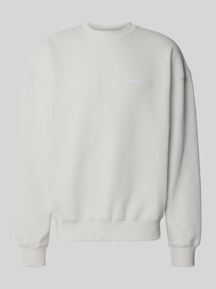 Produktfoto, Oversized Fit Sweatshirt mit Logo-Stitching Modell 'Tate' von Pegador aus weißem Baumwoll-Mix mit Strukturmuster, Rundhalsausschnitt und elastischen Abschlüssen