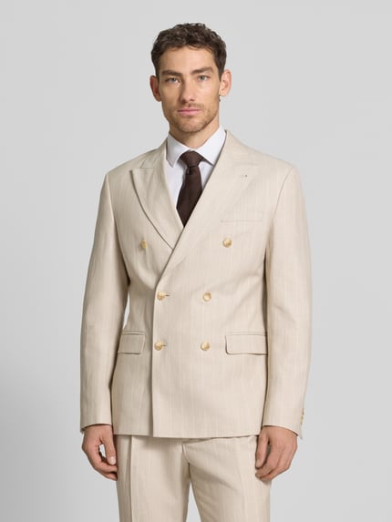 Männermodel trägt Regular Fit Sakko mit Pattentaschen und Reverskragen von MCNEAL, Material-Mix mit Leinen-Anteil, Ganzkörperansicht von vorne.