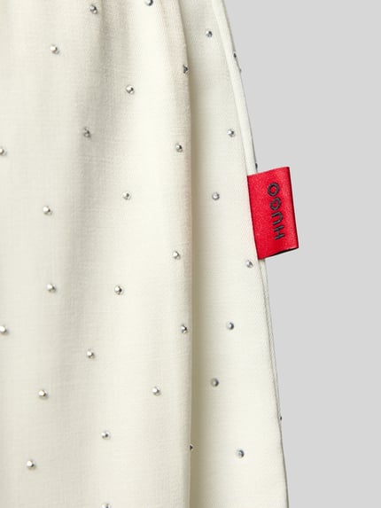 Produktfoto, cremefarbene Relaxed Fit Pyjama-Hose aus Viskose-Mix von HUGO, feine Punktstruktur, Damen Pyjama von HUGO