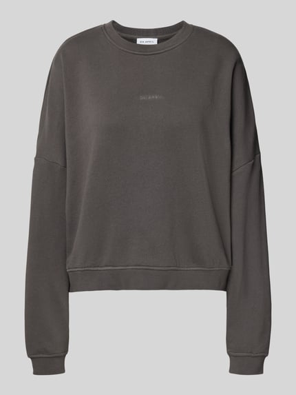 Produktfoto, Oversized Sweatshirt mit Label-Stitching von OH APRIL in Dunkelgrau aus reiner Baumwolle, oversized, Rundhalsausschnitt, glatte Textur.