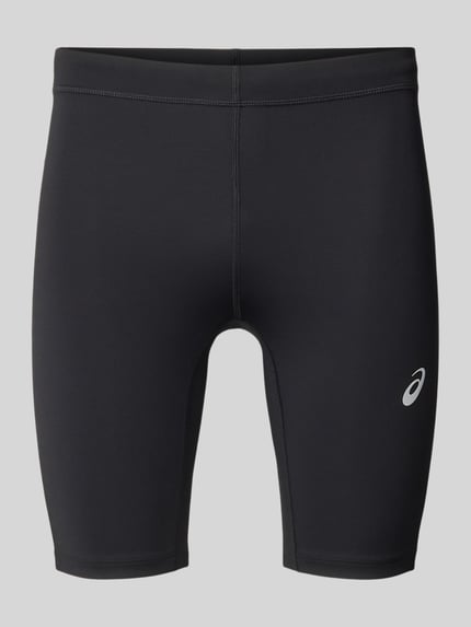 Produktfoto, schwarze Slim Fit Radlerhose mit Logo-Print Modell 'Core' von ASICS TIGER, elastischer Material-Mix, glatte Oberfläche.