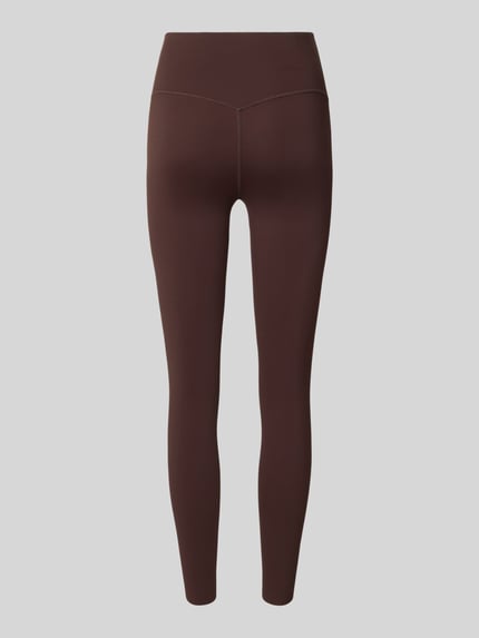 Produktfoto, dunkelbraune Leggings mit elastischem Bund Modell 'Sense' von aim'n, körpernah, glatte Textur, Damen Leggings