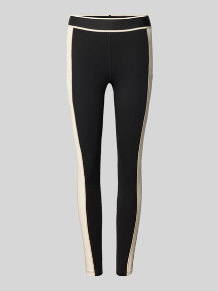 Produktfoto, schwarze Slim Fit Leggins mit beigem Seitenstreifen, elastischer Bund, Modell 'MALBON' von Fabletics, Knöchellänge.