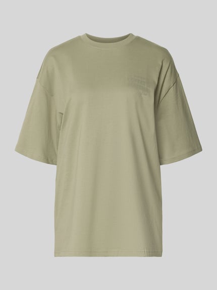 Produktfoto, Oversized T-shirt met statementprint van REVIEW in lichtgroen, puur katoen, oversized fit, ronde hals, ruglengte maat S 70 cm