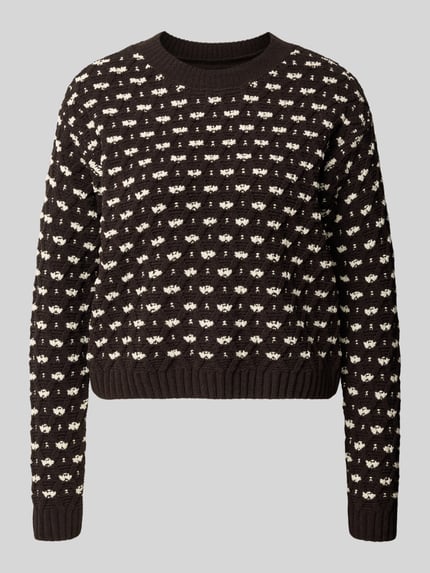 Produktfoto, Pullover mit Bouclé-Struktur VMSHARON von VERO MODA in Schwarz mit cremefarbenem Allover-Muster, Strickoptik, gerippte Bündchen