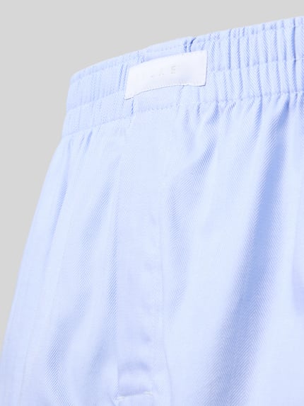 Produktfoto, hellblaue Boxershorts mit elastischem Bund und Label-Patch Modell 'Daily' von FALKE, reine Baumwolle, strukturierte Oberfläche