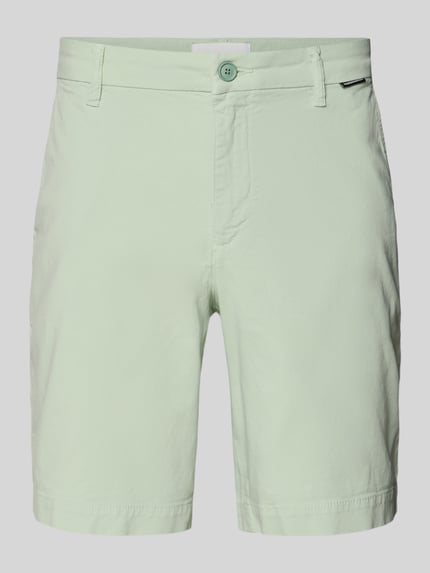 Produktfoto, Regular Fit Chinoshorts aus Baumwoll-Mix Modell 'CHINO' von Armedangels, jednolity kolor, krój regular fit, szlufki na pasek, kieszenie boczne i tylna, zapięcie na guzik i ukryty zamek, metka, materiał bawełniany z domieszką
