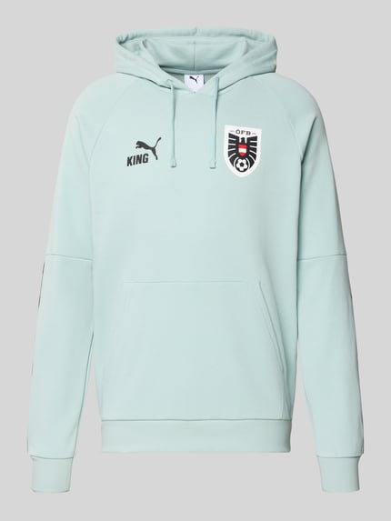 Produktfoto, Hoodie mit Känguru-Tasche Modell 'ÖFB KING' von PUMA PERFORMANCE, bawełniany mix, krój regular fit, jasnomiętowy, 70 cm długości tyłu i rękawa w rozmiarze M, kieszeń z przodu