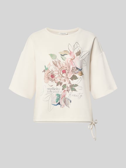 Produktfoto, Relaxed Fit T-Shirt mit Statement-Print von Christian Berg Woman, floraler Print, helle Farben, elastischer Material-Mix mit Modal-Anteil