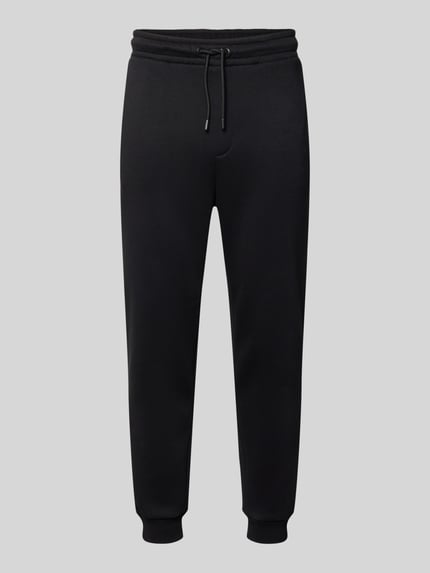 Productfoto, Regular Fit Sweatpants met steekzakken model 'GORDON' van JACK & JONES, katoenmix, elastische tailleband met trekkoord, gulp, achterzak, binnenbeenlengte maat M 70 cm, zwart, rechte pijpen, zachte textuur