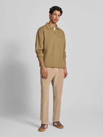 Tommy Jeans Spodnie sztruksowe o kroju tapered fit z czystej bawełny model ‘ISAAC’ Beżowy 1