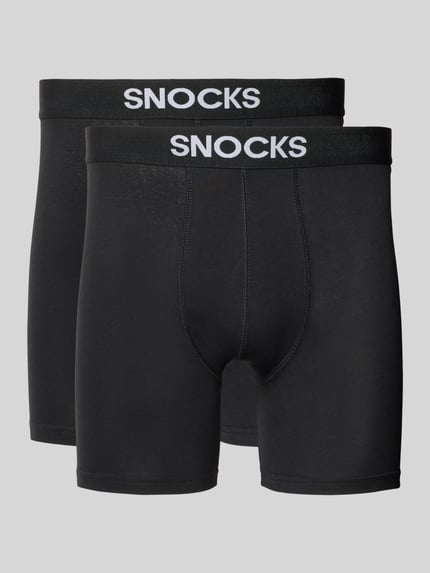 Produktfoto, zwei schwarze Boxershorts mit elastischem Label-Bund von Snocks aus Gewachste-Baumwolle-Mix mit Stretch-Anteil und Inside-Out-Nähte.