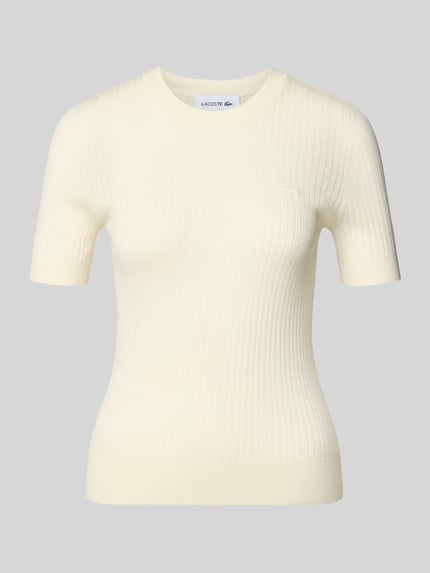 Produktfoto, Regular Fit Strick-Shirt aus reiner Wolle von Lacoste in Creme, unifarben, feiner Rippstrick, Rundhals, Logo-Stitching