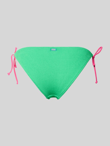 Produktfoto, Bikinibroekje met labeldetail Model 'LENKA' van Banana Moon, materiaalmix met stretch, nauwsluitend model, vetersluiting, felgroen met roze strikkoorden, fijne textuur