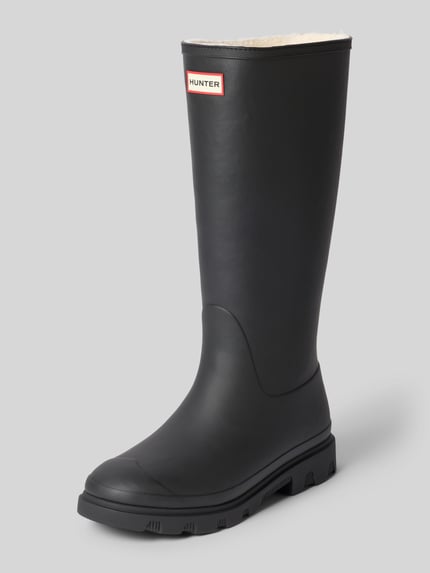 Produktfoto, Stiefel mit Label-Patch von Hunter in Schwarz mit abgerundeter Form, Innenfutter, profilierter Sohle, Absatzhöhe 3 cm, Schafthöhe 37 cm, Schaftweite 16 cm