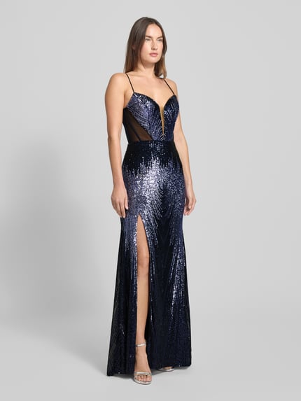 Vrouwenmodel draagt Slim Fit Abendkleid mit Allover-Pailettenbesatz van Mascara in donkerblauw met split, spaghetti bandjes, semi-transparant, volledige lichaamsaanzicht vooraan.