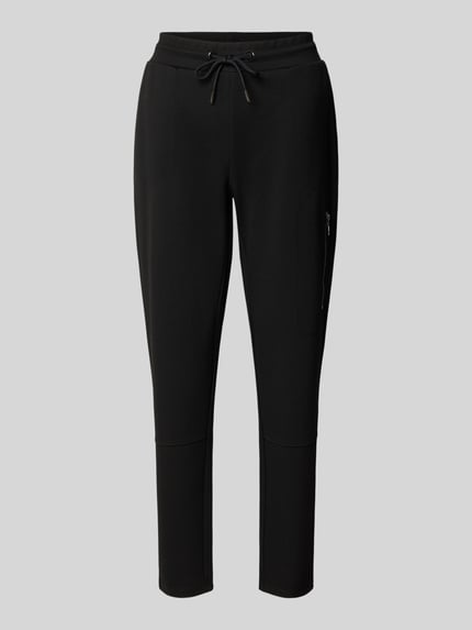 Produktfoto, Slim Fit Sweatpants aus Viskose-Mix von monari, schwarze Farbe, elastischer Bund mit Tunnelzug, verkürzte Passform, glatte Textur, Damen Sweatpants