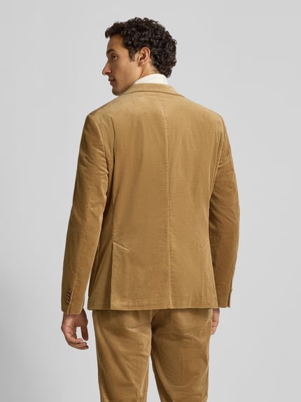 Männermodel trägt Sakko in Cord-Optik mit seitlichen Eingrifftaschen von MCNEAL in Beige, Baumwoll-Mix, Regular Fit, Ganzkörperansicht Rückansicht.