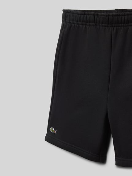 Productfoto, Regular Fit Sweatshorts aus katoenmix van Lacoste in effen kleuren met logopatch, elastische boord met tunnelkoord, zijsteekzakken, sweatmateriaal
