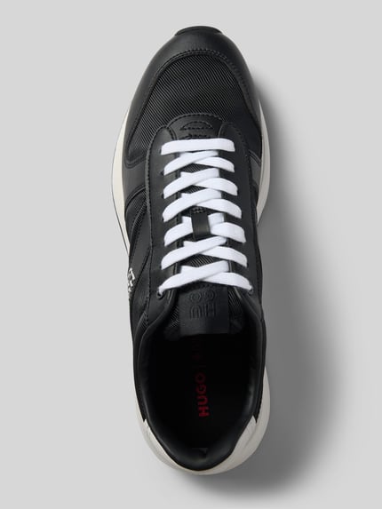Produktfoto, Sneaker mit Label-Datei Modell 'GO3_nypu' von HUGO in Schwarz mit weißen Schnürsenkeln und heller Sohle, Herren Sneaker von HUGO