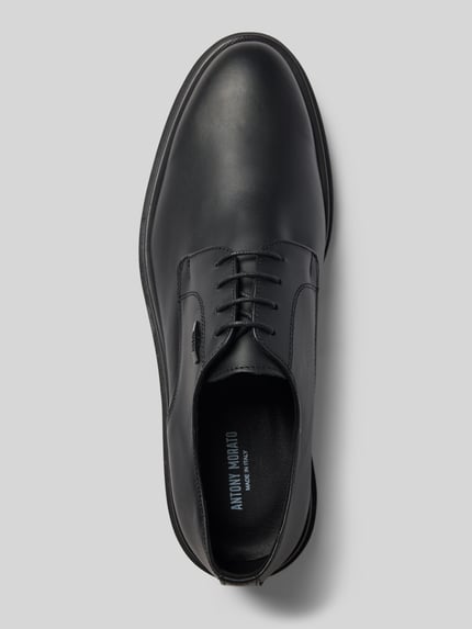 Produktfoto, Schnürschuhe aus echtem Leder Modell 'Sean' von Antony Morato, czarny kolor, zaokrąglony czubek, detal z logo, wysokość obcasa 4 cm, wysokość cholewki 7 cm, szerokość w rozmiarze 44: 11 cm, naturalna skóra