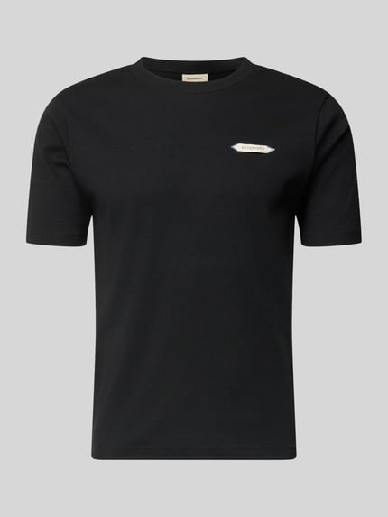 Produktfoto, schwarzes Slim Fit T-Shirt aus elastischem Baumwoll-Mix Modell 'L’ATELIER' von RETERNITY mit Label-Patch, glatte Struktur