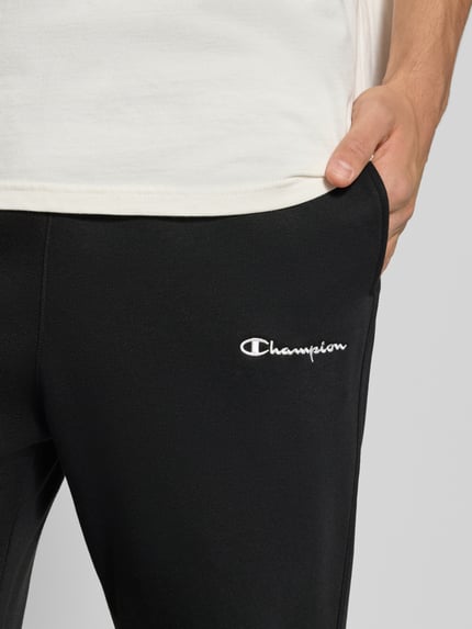 Champion Spodnie dresowe o kroju straight fit z wyhaftowanym logo model ‘Icons’ Czarny 3
