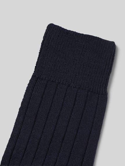 Produktfoto, Strümpfe aus Schurwollmischung Modell 'Teppich im Schuh' von FALKE in donkerblau met ribstructuur en versterkte zones.