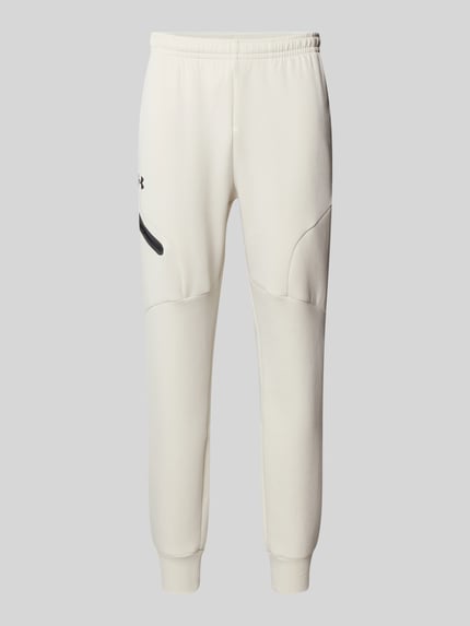 Under Armour Spodnie dresowe z elastycznym ściągaczem Złamany biały 2