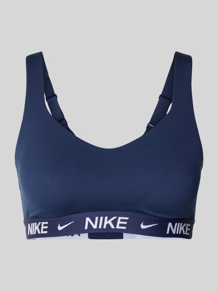 Produktfoto, Slim Fit sport-BH mit Logo-Detail Modell 'Indy' von NIKE TRAINING aus Elastischer-Material-Mix in Dunkelblau, weißes Logo-Detail, verstellbare Träger