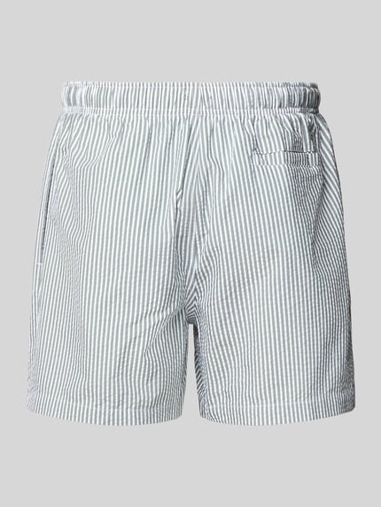 Produktfoto, Badehose mit elastischem Bund und Tunnelzug von MCNEAL aus Baumwoll-Mix im Regular-Fit mit Label-Stitching, feines Streifenmuster, glatte Textur.