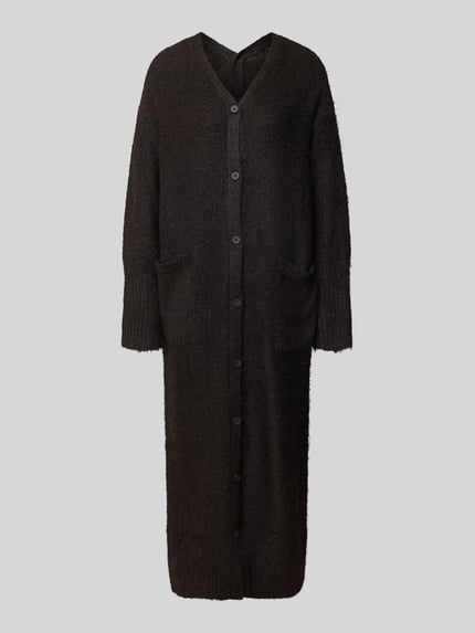 Produktfoto, langer schwarzer Longcardigan mit V-Ausschnitt und Knopfleiste, Struktur aus Material-Mix mit Woll-Anteil, Modell 'FIA' von Topshop, Regular Fit, zwei Taschen, Rückenlänge 118 cm, Ärmel 65 cm.