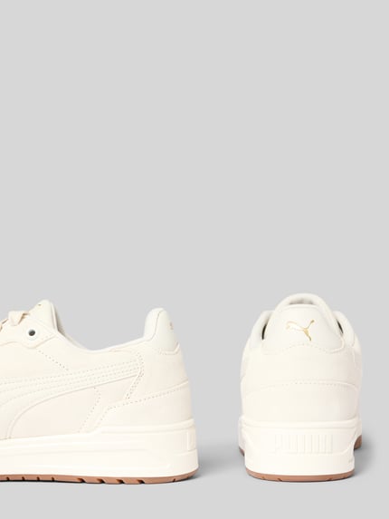 Produktfoto, Sneaker aus Leder mit Logo-Details Modell 'Shuffle Downtown' von PUMA in Beige, Lederstruktur, abgerundete Form, profilierte Sohle