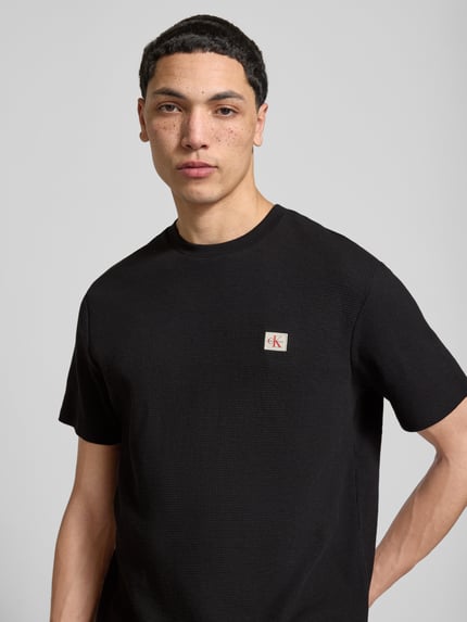 Calvin Klein Jeans T-shirt w kroju regular fit z naszywką z logo Czarny 3