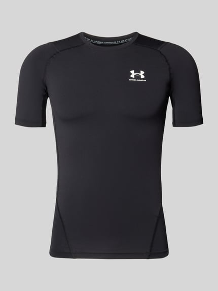 Produktfoto, Slim Fit T-Shirt mit Logo-Print von Under Armour, elastyczna mieszanka materiałów, krój slim fit, okrągły dekolt, długość tyłu w rozmiarze M 62 cm, kolor czarny