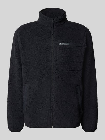 Produktfoto, Regular Fit Fleecejacke mit Logo-Patch von Columbia in Schwarz, mit Brusttasche, Stehkragen und elastischen Abschlüssen.