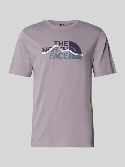 Produktfoto, Regular fit T-shirt van puur katoen Model 'MOUNTAIN LINE' van The North Face met labelprint en ronde hals, heren, ruglengte maat M 70 cm, effen pastelpaars, zachte stof, korte mouw.