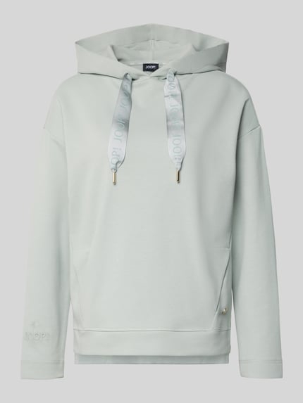 Produktfoto, Regular Fit Hoodie mit Logo-Applikation von JOOP!, Damen Hoodie aus Baumwoll-Mix mit Kapuze, Tunnelzug, elastische Abschlüsse, Eingrifftaschen und verlängerter Rückseite, helles einfarbiges Material mit weicher Textur.