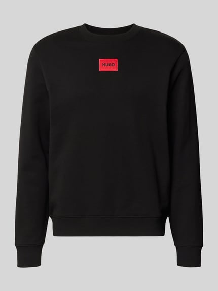 Produktfoto, czarny Sweatshirt aus Baumwolle Modell ' Diragol' od HUGO, prosty krój, czerwona naszywka, dzianinowa tekstura, bawełna