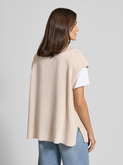 Vrouwenmodel draagt Loose Fit spencer met wol-aandeel model 'NOLA' van VILLA SOPHIE, look: effen, ribtricot, Ganzkörperansicht Rückansicht.