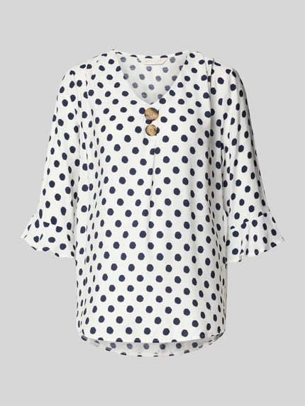 Produktfoto, Blusenshirt mit Viskose-Anteil von Apricot, biała tkanina w granatowe grochy, prosty krój, dekolt V, ozdobne guziki, rękaw 3/4, długość tyłu w rozmiarze S 67 cm, długość rękawa 41 cm, mieszanka materiałów