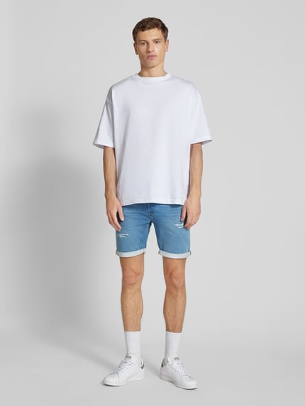 JACK & JONES Szorty jeansowe o kroju regular fit z przetarciami model ‘RICK’ Niebieski 1