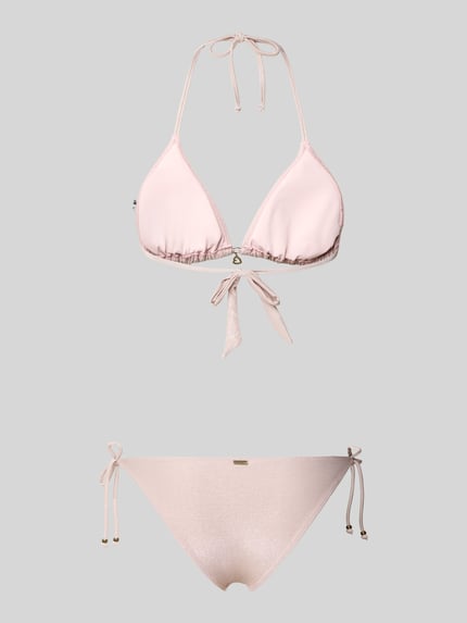 Produktfoto, Bikini mit wattierten Cups und seitlicher Schnürung von Banana Moon in zartem Rosa mit Stretch-Anteil, Herz-Anhänger und Glitzerstruktur.