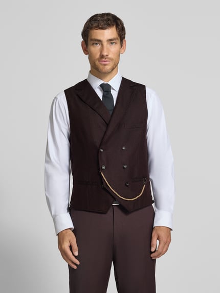 Männermodel trägt Weste aus Woll-Mix mit Reverskragen Modell 'Mathew' von CG – CLUB of GENTS, regular fit, dunkel, Ganzkörperansicht von vorne.