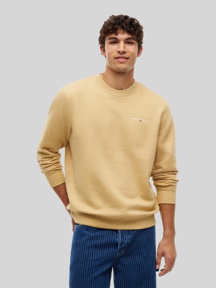 Tommy Jeans Bluza o kroju regular fit z małym napisem z logo Beżowy 4