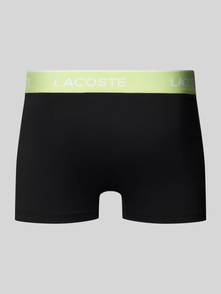 Produktfoto, Trunks aus Baumwoll-Mix im 3er-Pack von Lacoste in Schwarz mit grünem, elastischem Label-Bund und Skinny Fit, unifarben