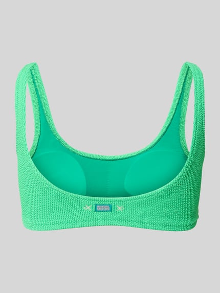 Produktfoto, grünes Bikini-Oberteil mit Label-Detail Modell 'JUSTIN' von Banana Moon aus Material-Mix mit Stretch-Anteil, Körpernaher-Schnitt